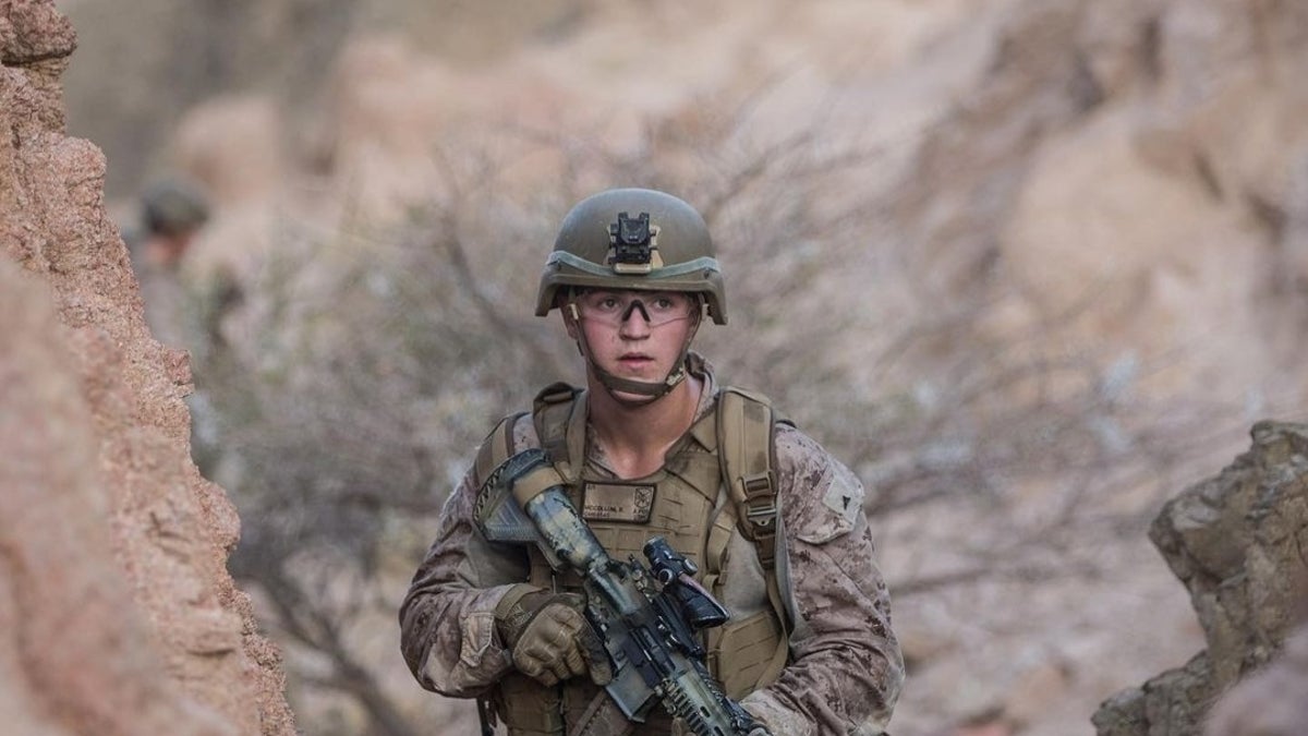 Rylee McCollum in tactical Marine gear