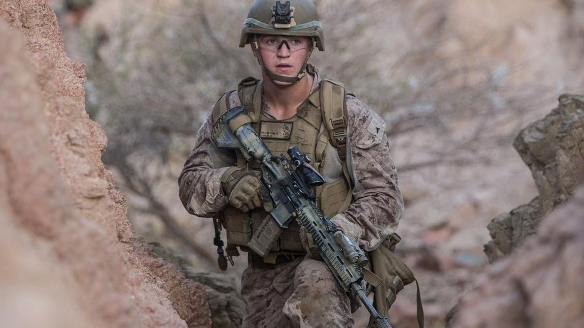 Rylee McCollum in tactical Marine gear