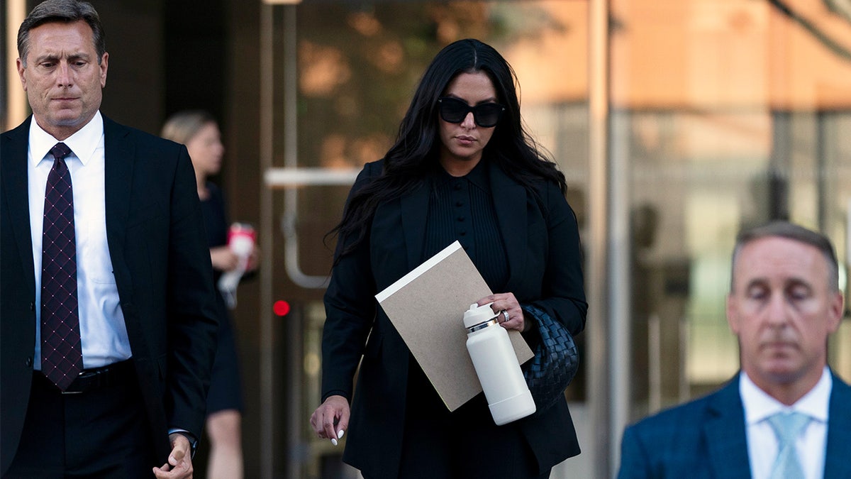 Vanessa Bryant in black leaving U.S. District Court in Los Angeles