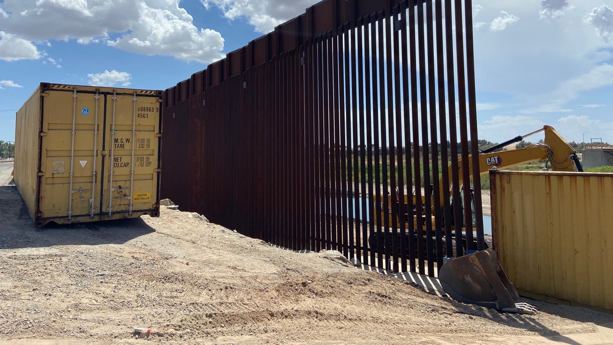 Yuma border wall shipping containers close gaps