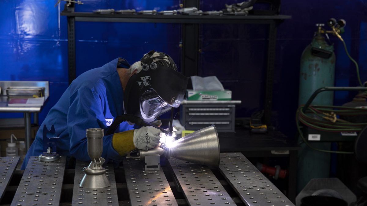 A welder at Launcher in Hawthorne, California, US, on Wednesday, April 20, 2022.