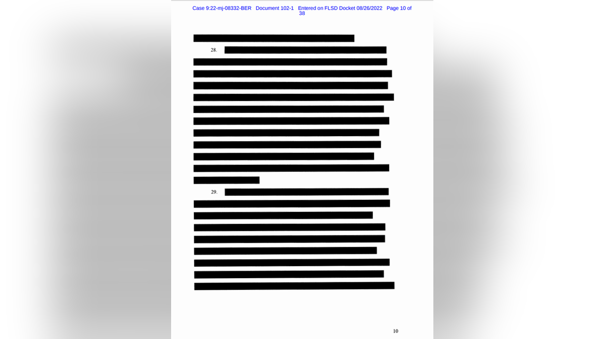 Completely redacted search warrant affidavit page.