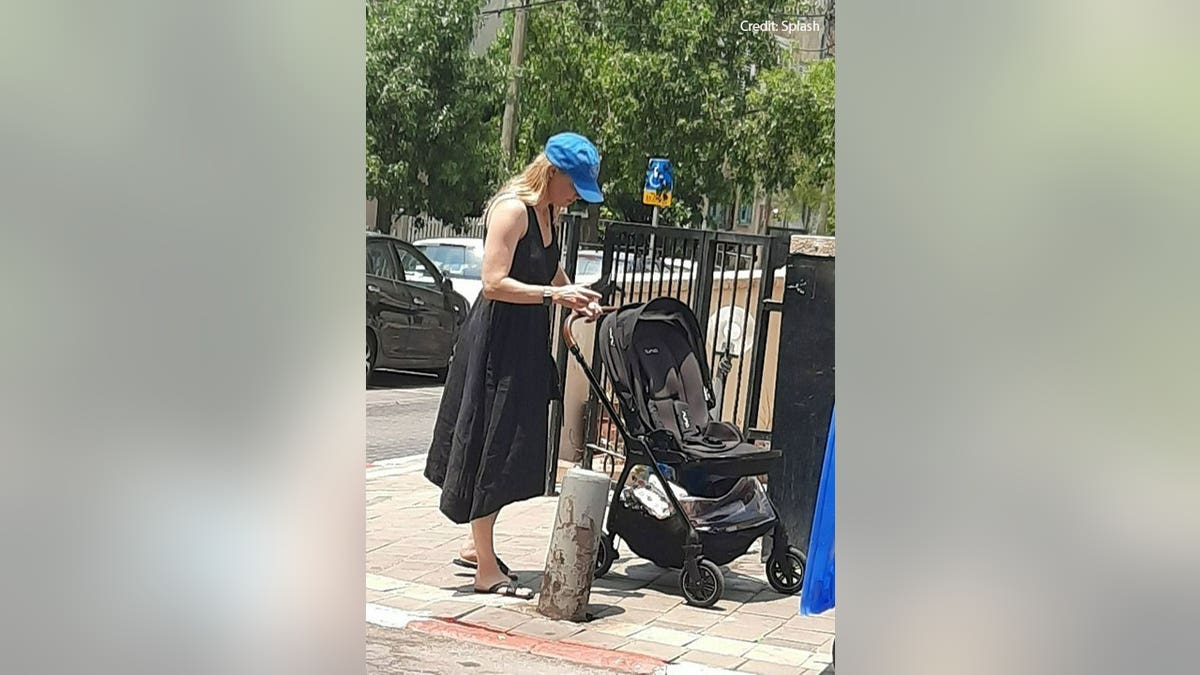 Amber Heard in Tel Aviv pushing an empty stroller