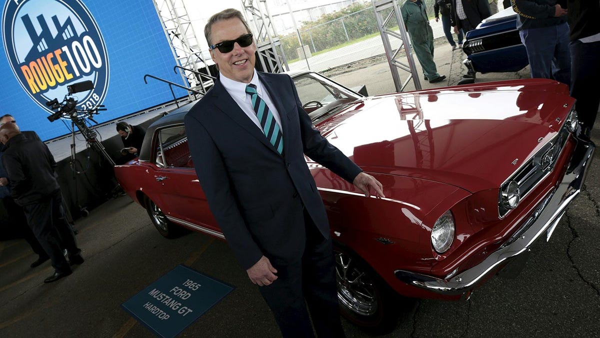 Bill Ford with a Mustang