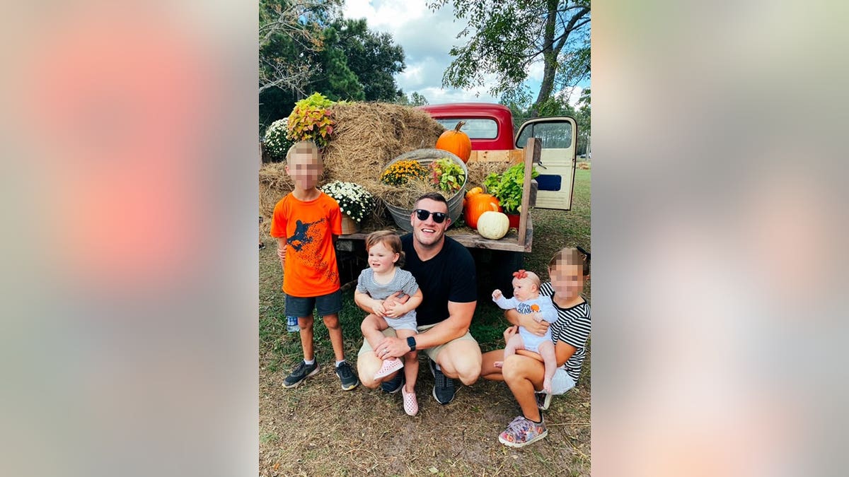 Jared Bridegan with his four children