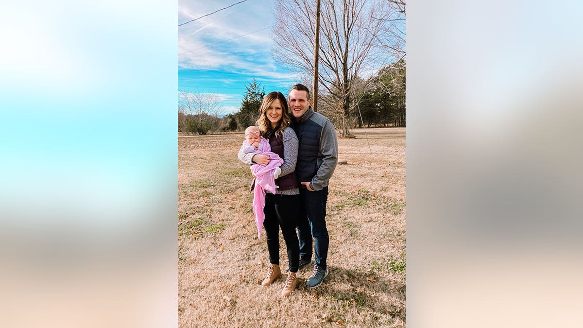 Kirsten Bridegan with her slain husband Jared Bridegan and their daughter London