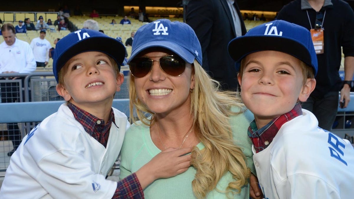 Britney Spears at a baseball game with her sons in 2013