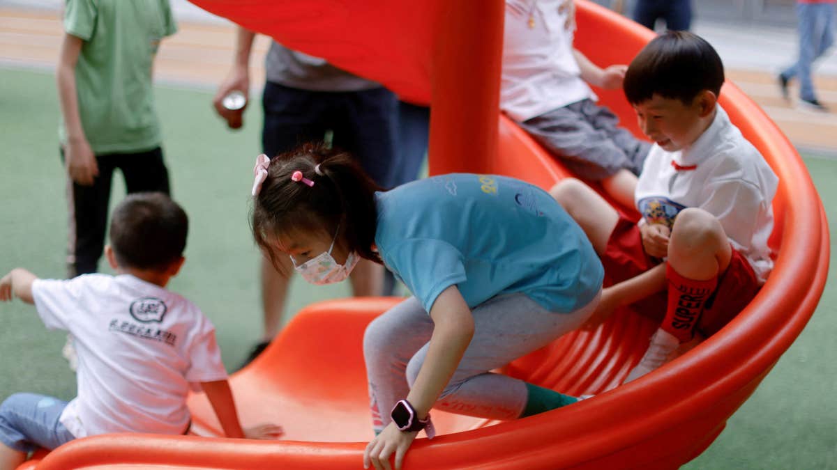 Kids play in a park