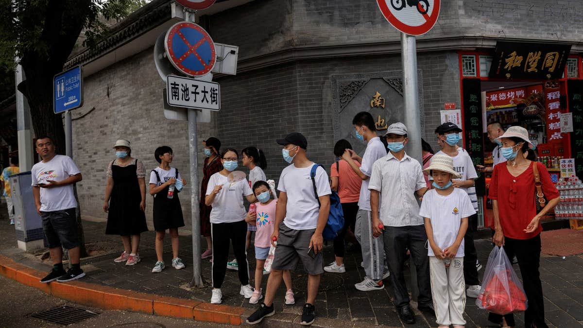 Chinese residents wearing masks outside