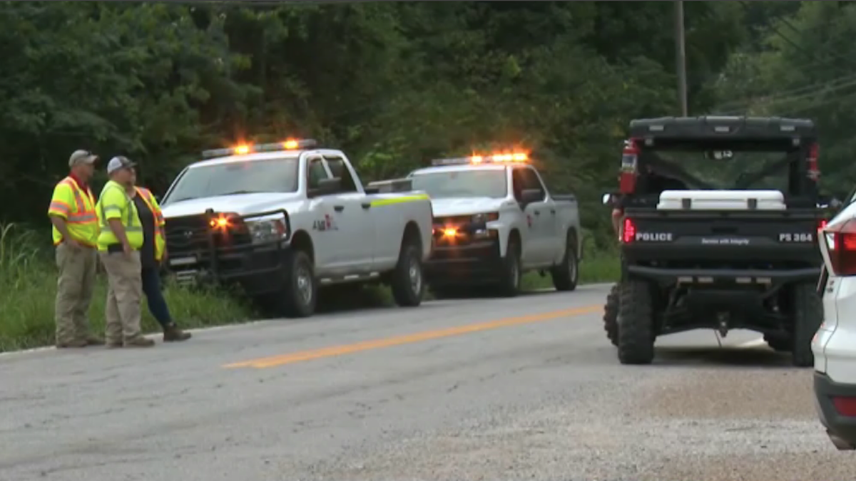 Emergency workers on road