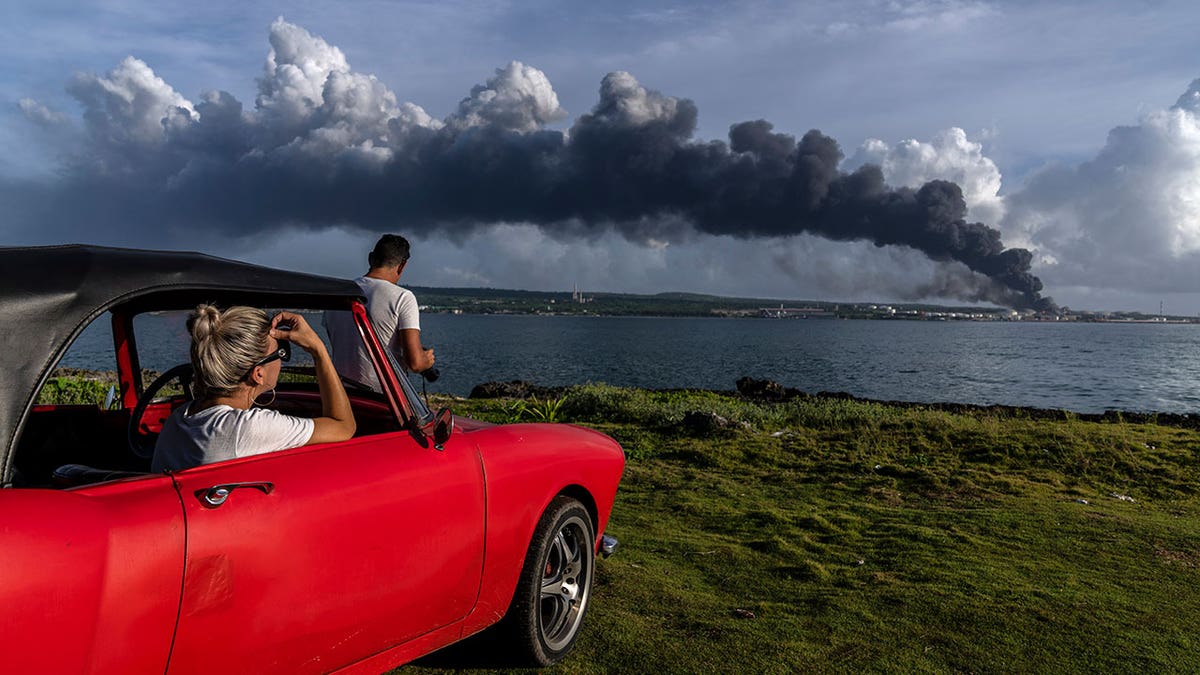 Smoke rises from Cuban oil tank farm