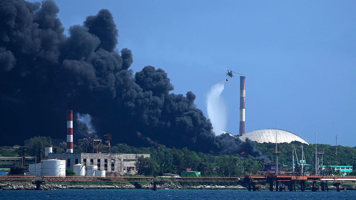 Helicopter tries to help put out Cuban fire