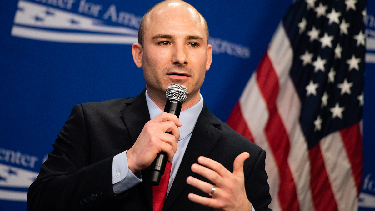 Photo shows Fairfax County Commonwealth Attorney Descano speaking at event