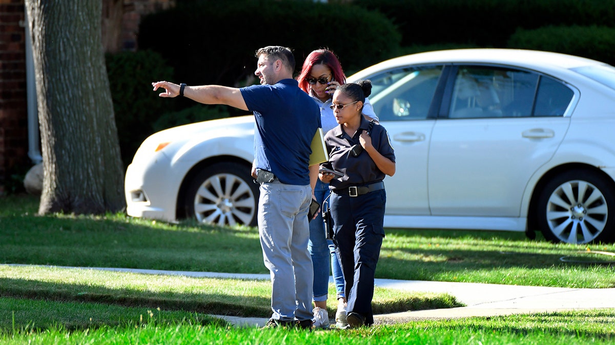 Detroit police look over random shooting scene