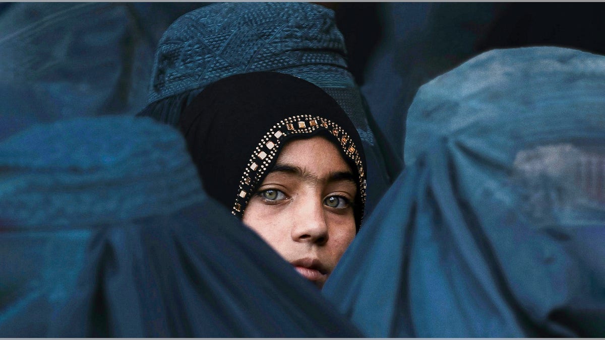 Afghan girl in a head scarf