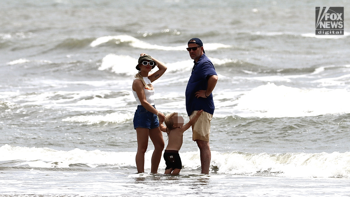 Hunter Biden and family play in South Carolina waves