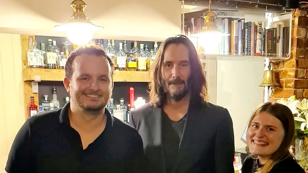 Hotel staff and Keanu Reeves