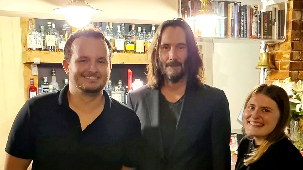 Hotel staff and Keanu Reeves