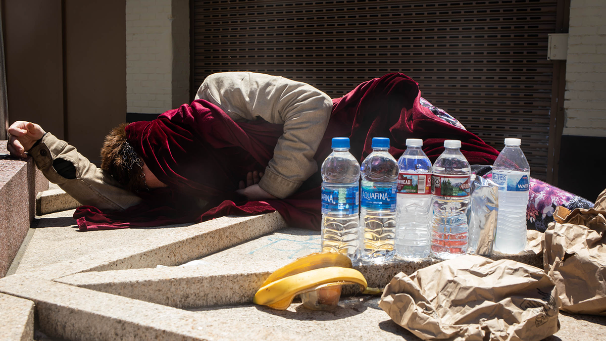 Homeless person sleeping on the street