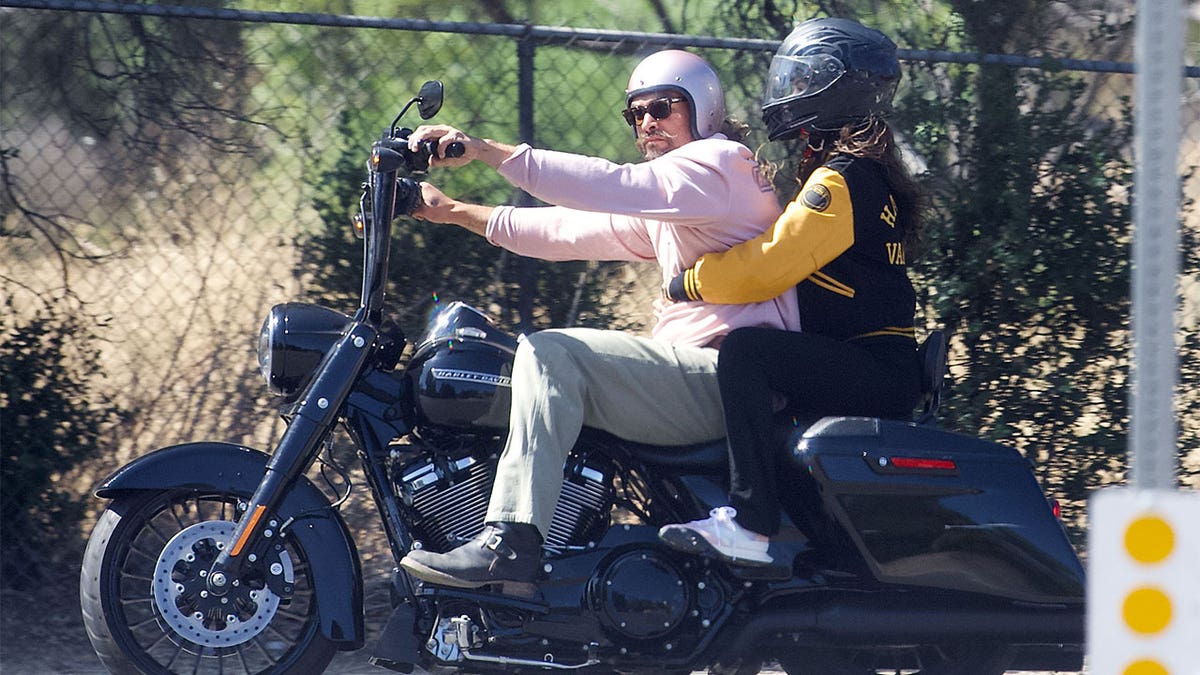 Jason Momoa and Eiza Gonzalez on a motorcycle