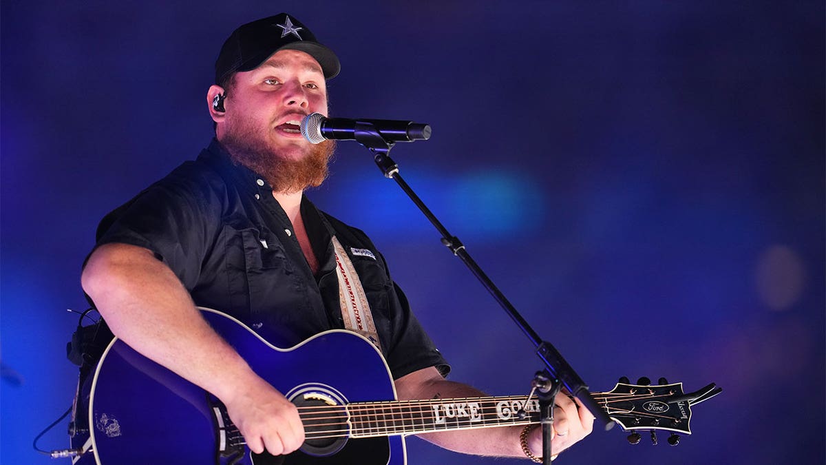 Luke Combs performing at NFL halftime show