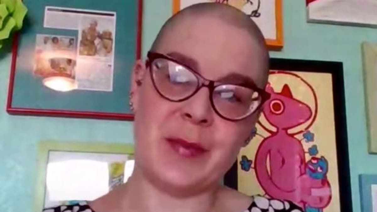 Screenshot of Miranda Galbreath in glasses with a polka-dot top from YouTube video