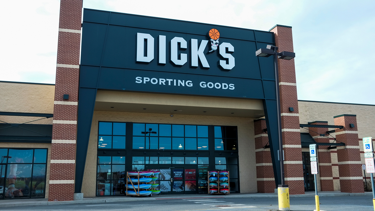 Photo shows outside view of Dick's Sporting Goods sign and entrance