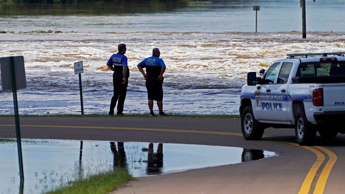 police watch spillway of pearl river