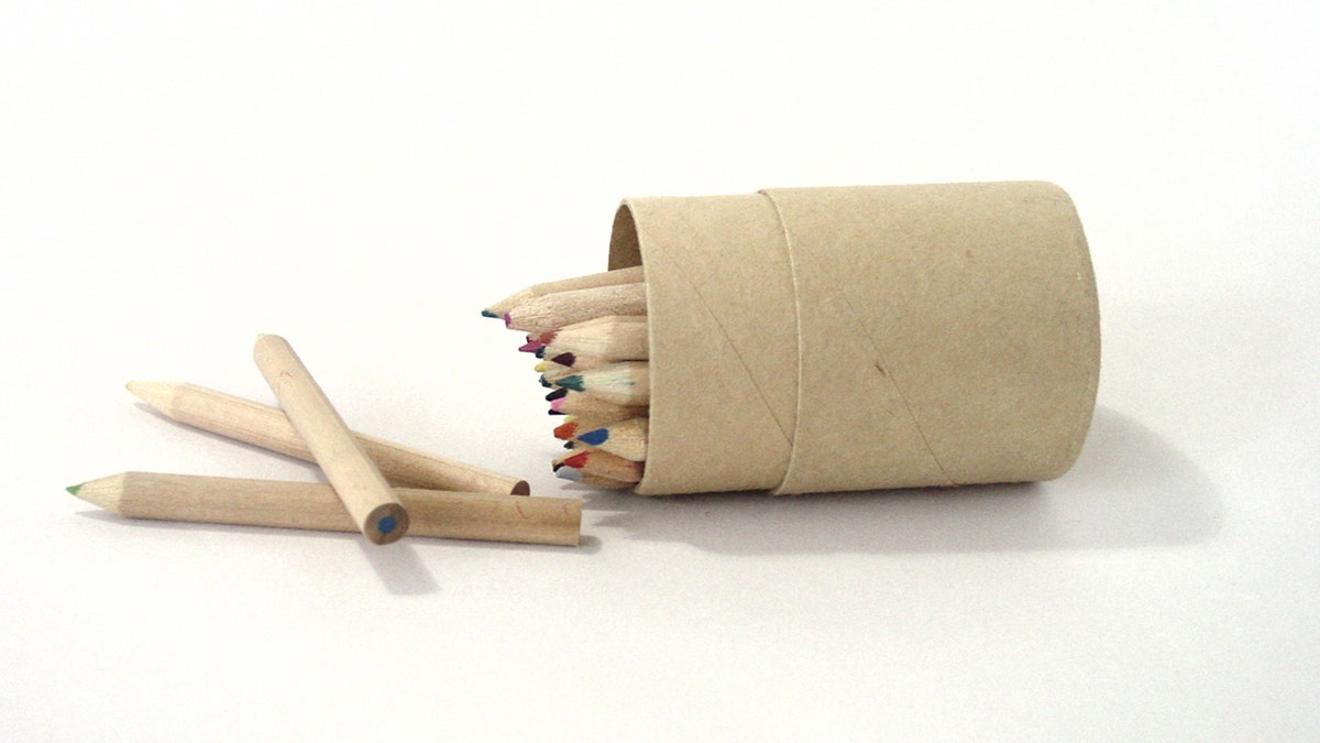 pencils in a cardboard container