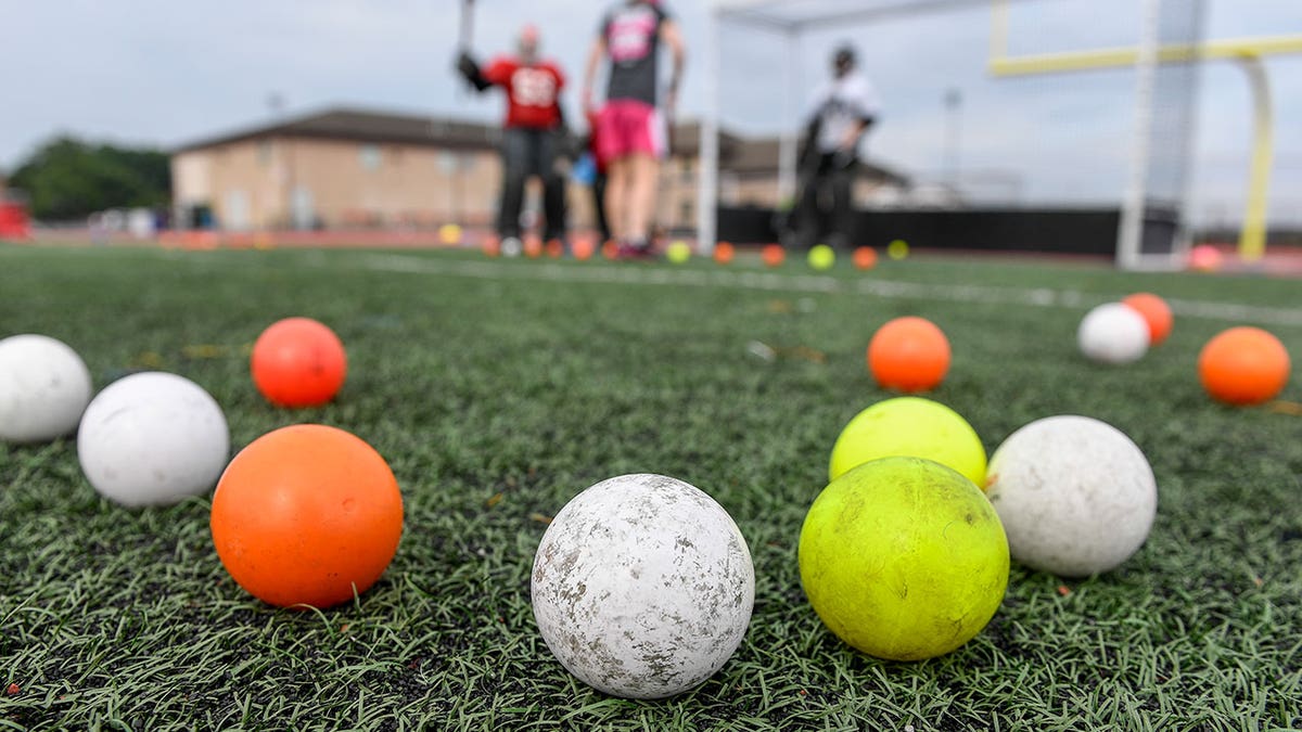 Field hockey balls on school sports field