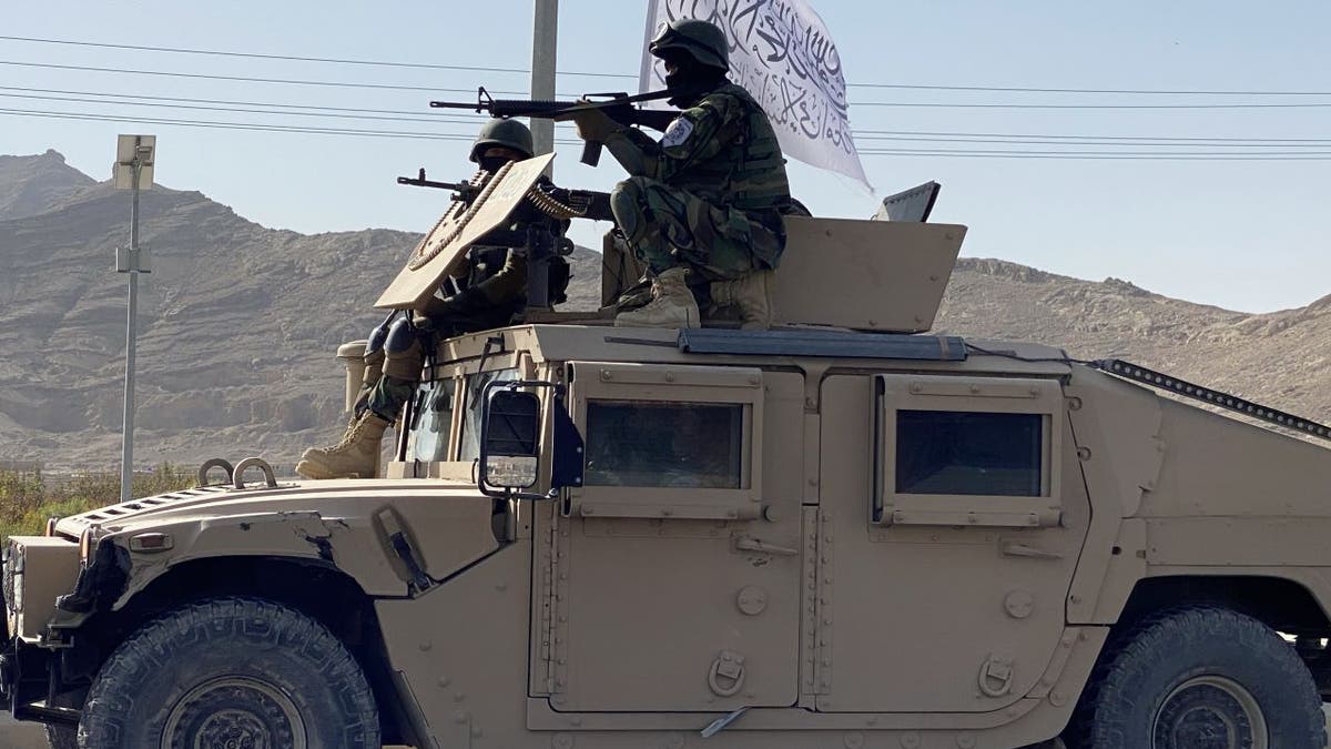 Taliban soldier rides in U.S. military vehicle left behind during Afghanistan withdraw