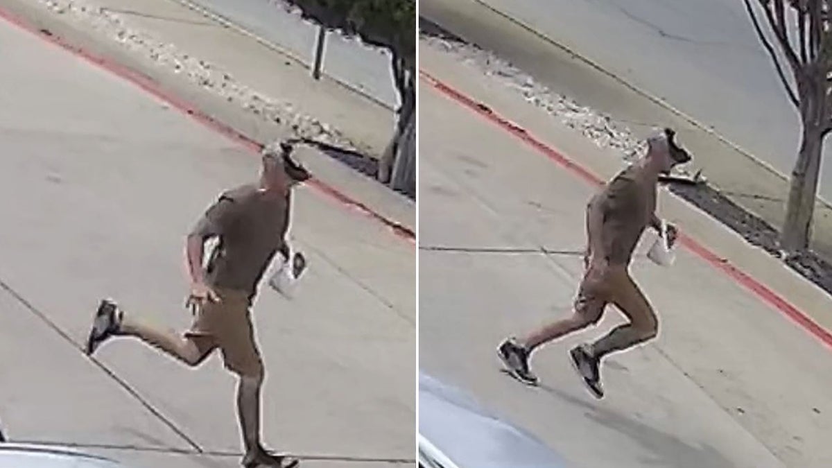 suspected car thief running through parking lot