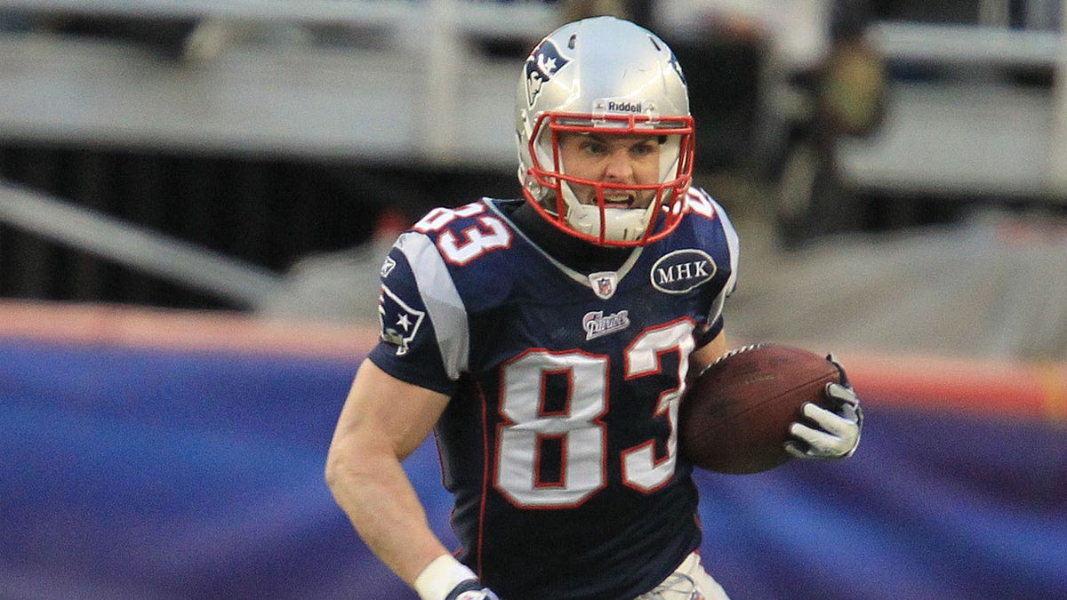 Wes Welker running with ball