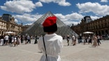 Tourists at the Louvre