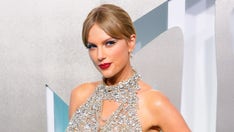 Taylor Swift takes home VMAs video of the year award, announces surprise album