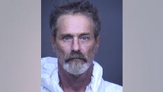 Armed Arizona man detains murder suspect who allegedly ran over neighbor with vehicle, stomped his head