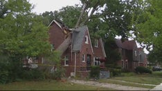 Michigan storms leave nearly 110K without power, flood roads