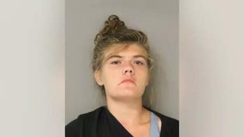 Chicago woman charged with killing panhandler during turf war