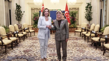Nancy Pelosi arrives in Singapore as she begins tour of Asia