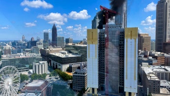 Atlanta skyscraper fire sends a dark column of smoke into the sky