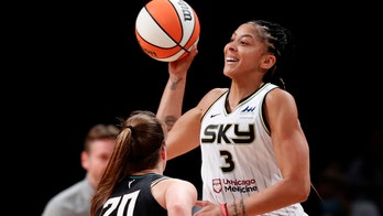 Two-time WNBA champion Candace Parker says she plans to sign with Las Vegas Aces