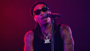 Fans flee Wiz Khalifa concert in mass panic amid unfounded concerns of a shooting