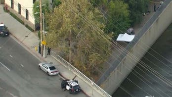Los Angeles man found stabbed to death on running path, suspect at large, police say