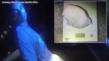 Body cam shows Florida man try to hide large bag of meth under cop car