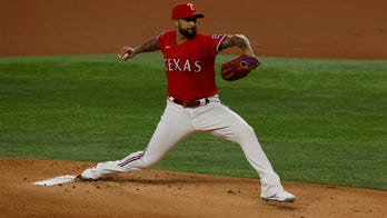 Brewers acquire relief pitcher Matt Bush from Rangers