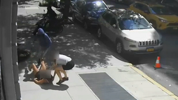 New York City woman fights off pair of moped-riding robbers: police