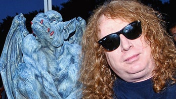 Rock guitarist found dead, allegedly killed by his own son