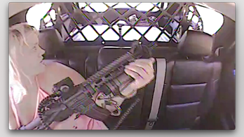 Oklahoma woman slips out of cuffs, shoots man and deputy from back of police cruiser, video shows