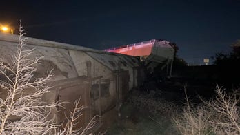 Two train cars derail in Texas leaving at least 1 person dead