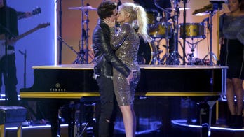 Meghan Trainor relives viral kiss with Charlie Puth at the 2015 American Music Awards